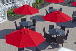 Resort umbrellas shading outdoor dining tables